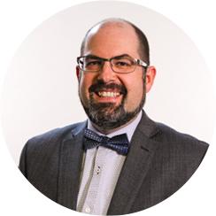 Headshot of Routeique team member.