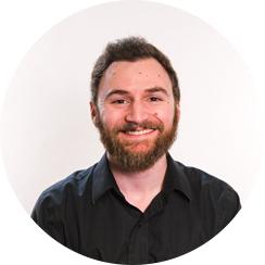 Headshot of Routeique team member.