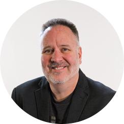 Headshot of Routeique team member.