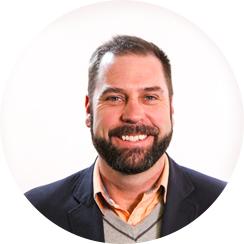 Headshot of Routeique team member.